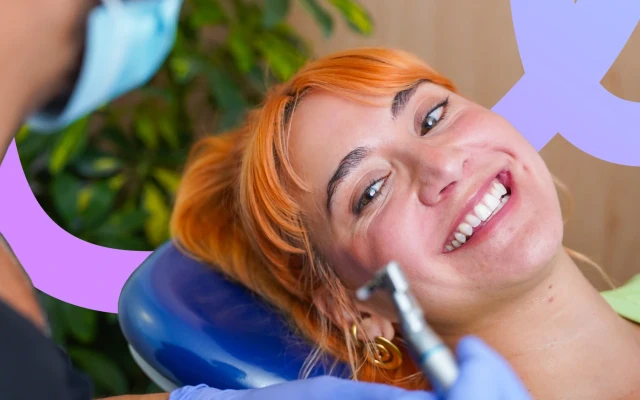Patient smiling in the dental chair during a cleaning visit at hisonrisa in Roma Sur.