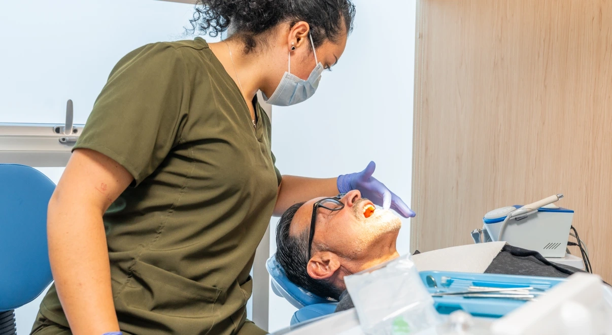 Patient during an in-office teeth whitening session.
